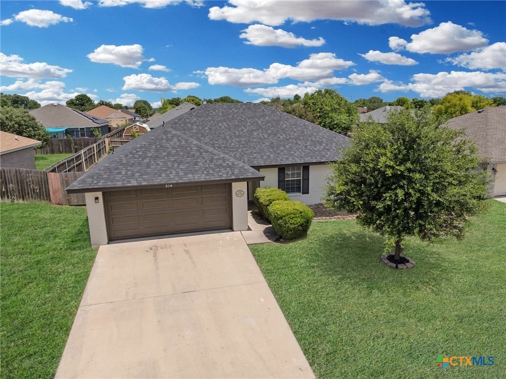 214 Timber Ridge Drive Nolanville, TX 76559 - Photo 4 of 31 a front view of a house with garden