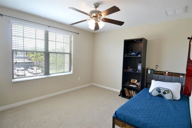 a view of livingroom with furniture and a window