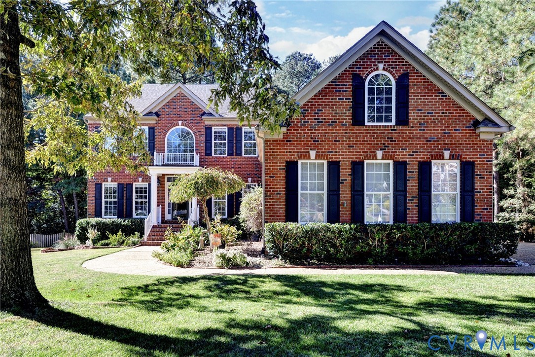 9405 Ashlock Court Toano, VA 23168 - Photo 2 of 43 a front view of a house with a yard