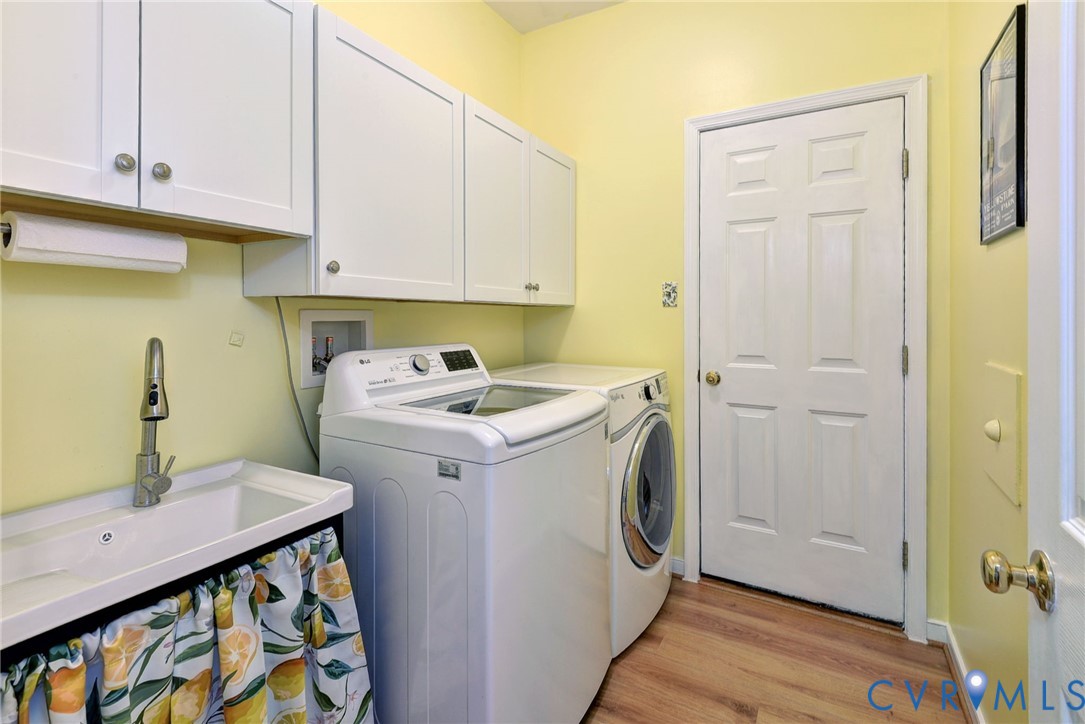 9405 Ashlock Court Toano, VA 23168 - Photo 22 of 43 a utility room with dryer and washer