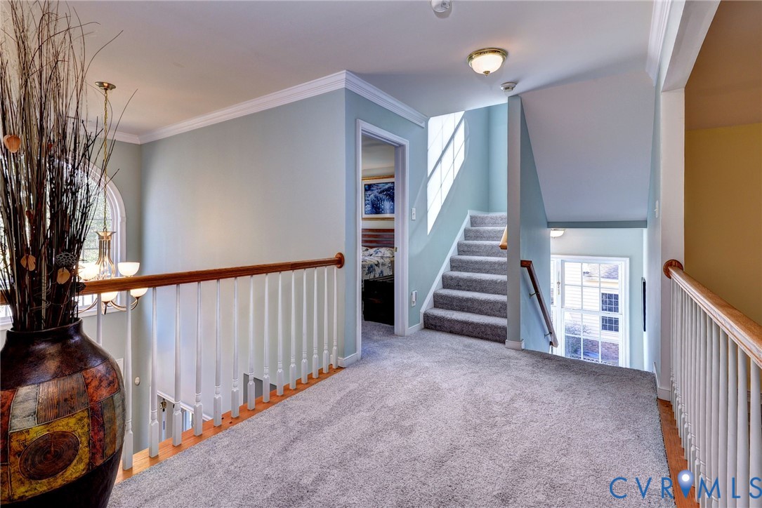 9405 Ashlock Court Toano, VA 23168 - Photo 24 of 43 a view of a hallway with staircase