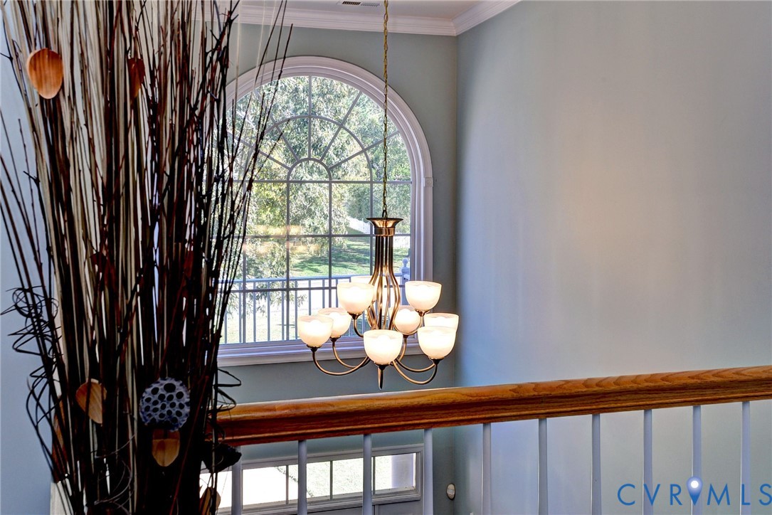 9405 Ashlock Court Toano, VA 23168 - Photo 25 of 43 a front view of a house with garden