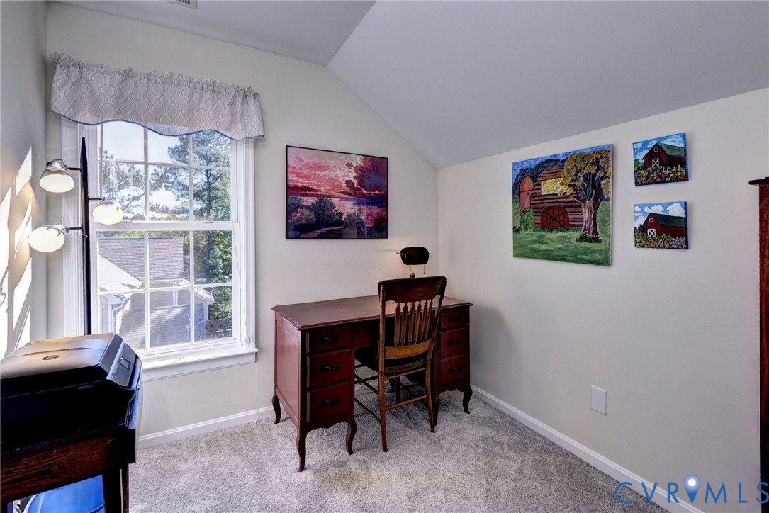 9405 Ashlock Court Toano, VA 23168 - Photo 32 of 43 a view of a workspace with furniture and a window