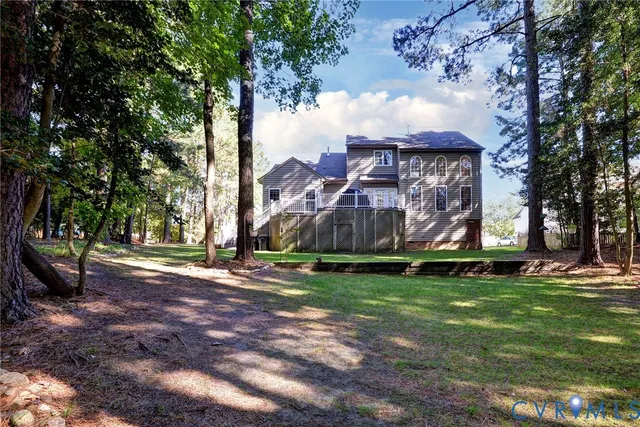 a view of a park with large trees