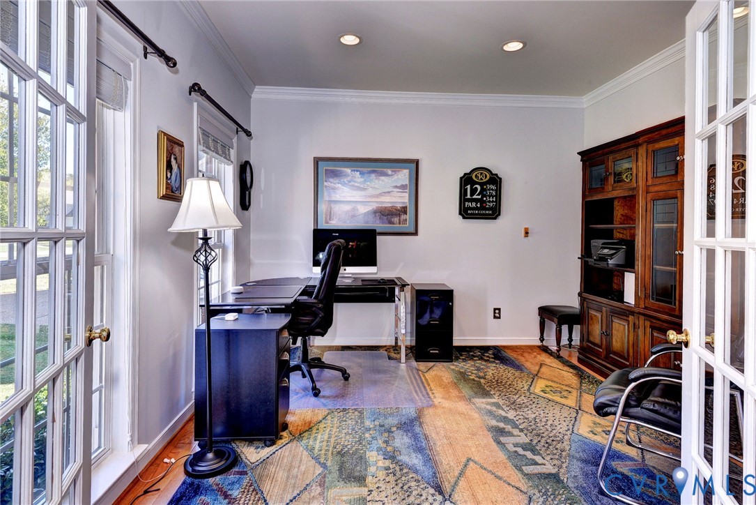 9405 Ashlock Court Toano, VA 23168 - Photo 7 of 43 a view of a workspace with furniture and workspace