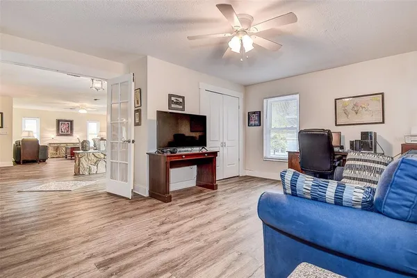 an aerial view of a house with a yard