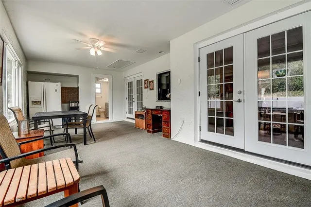 a view of a swimming pool with a patio