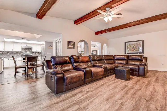 a view of a dining room with furniture and window
