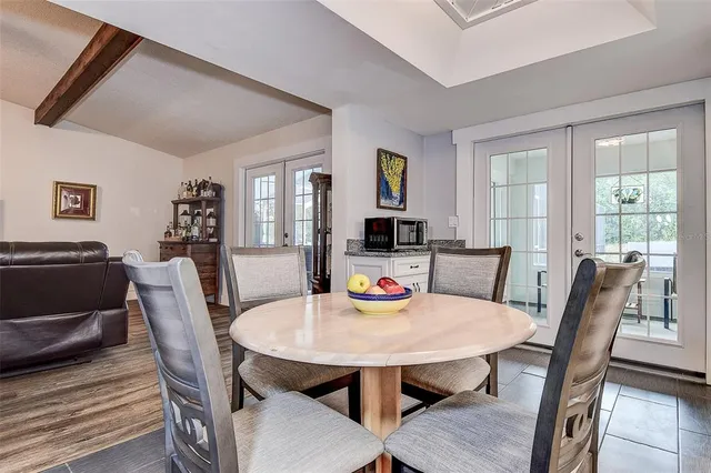 a kitchen with a refrigerator and a sink