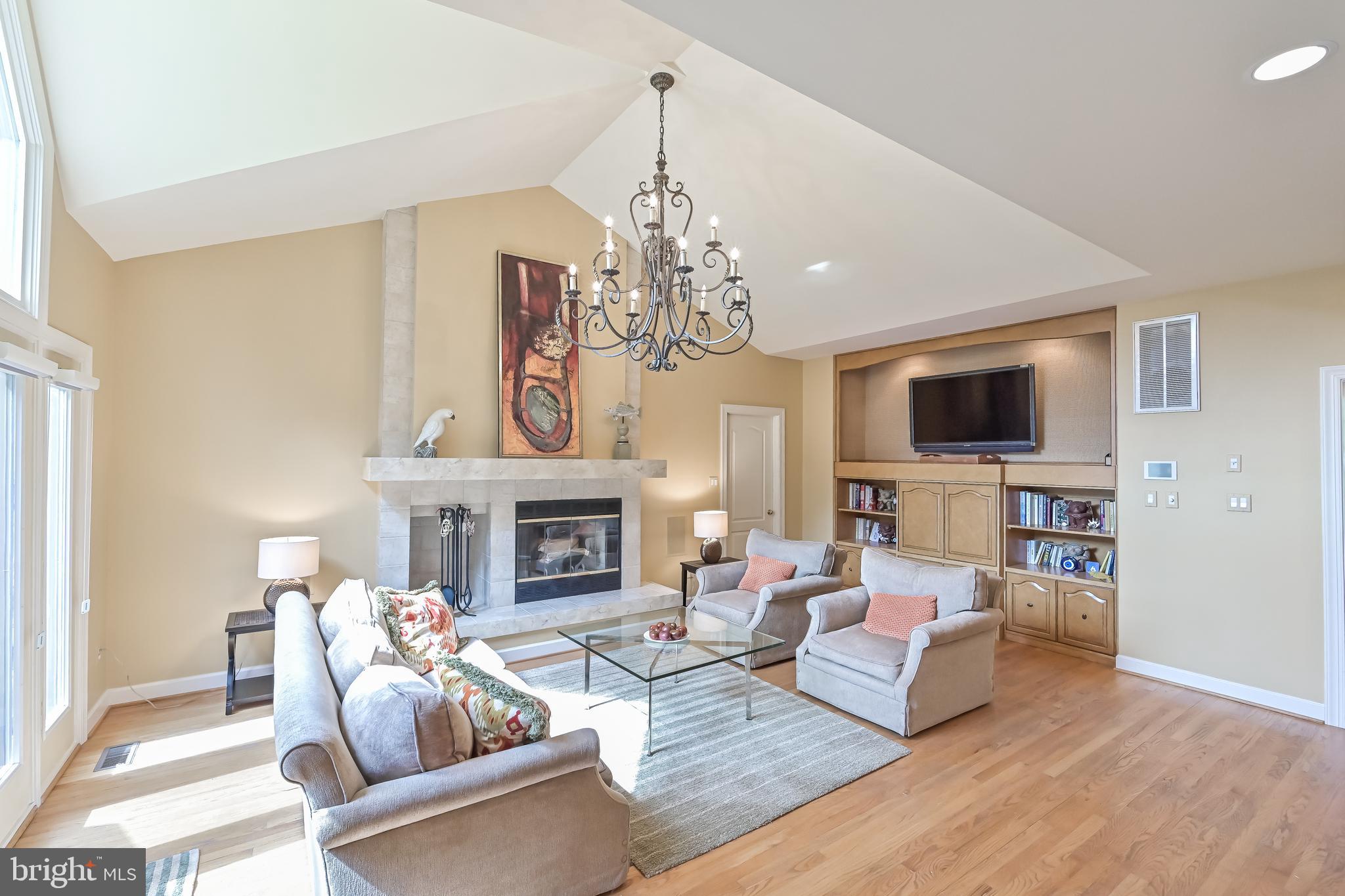 11311 Bright Pond Lane Reston, VA 20194 - Photo 16 of 50 Cathedral Ceiling + Fireplace in Family Room