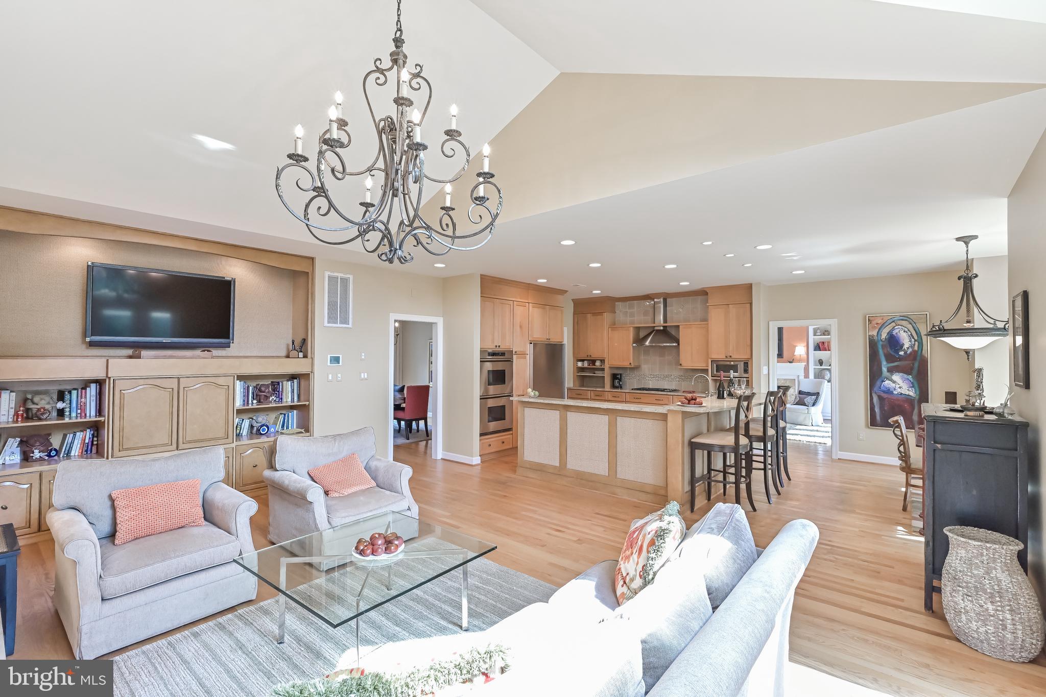 11311 Bright Pond Lane Reston, VA 20194 - Photo 17 of 50 Family Room w/ Custom Built-ins + Chandelier