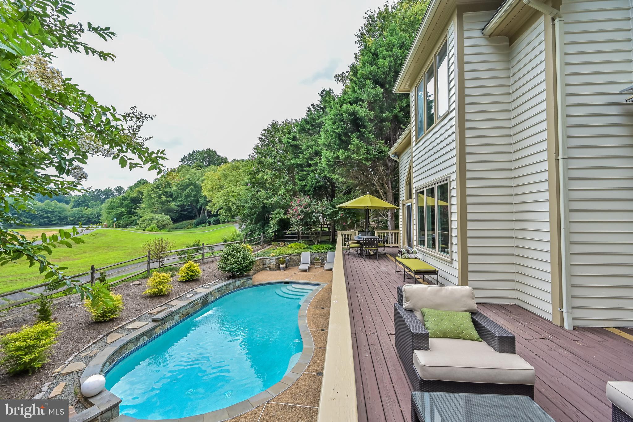 11311 Bright Pond Lane Reston, VA 20194 - Photo 19 of 50 Rear Deck Overlooking Pool off Family Room