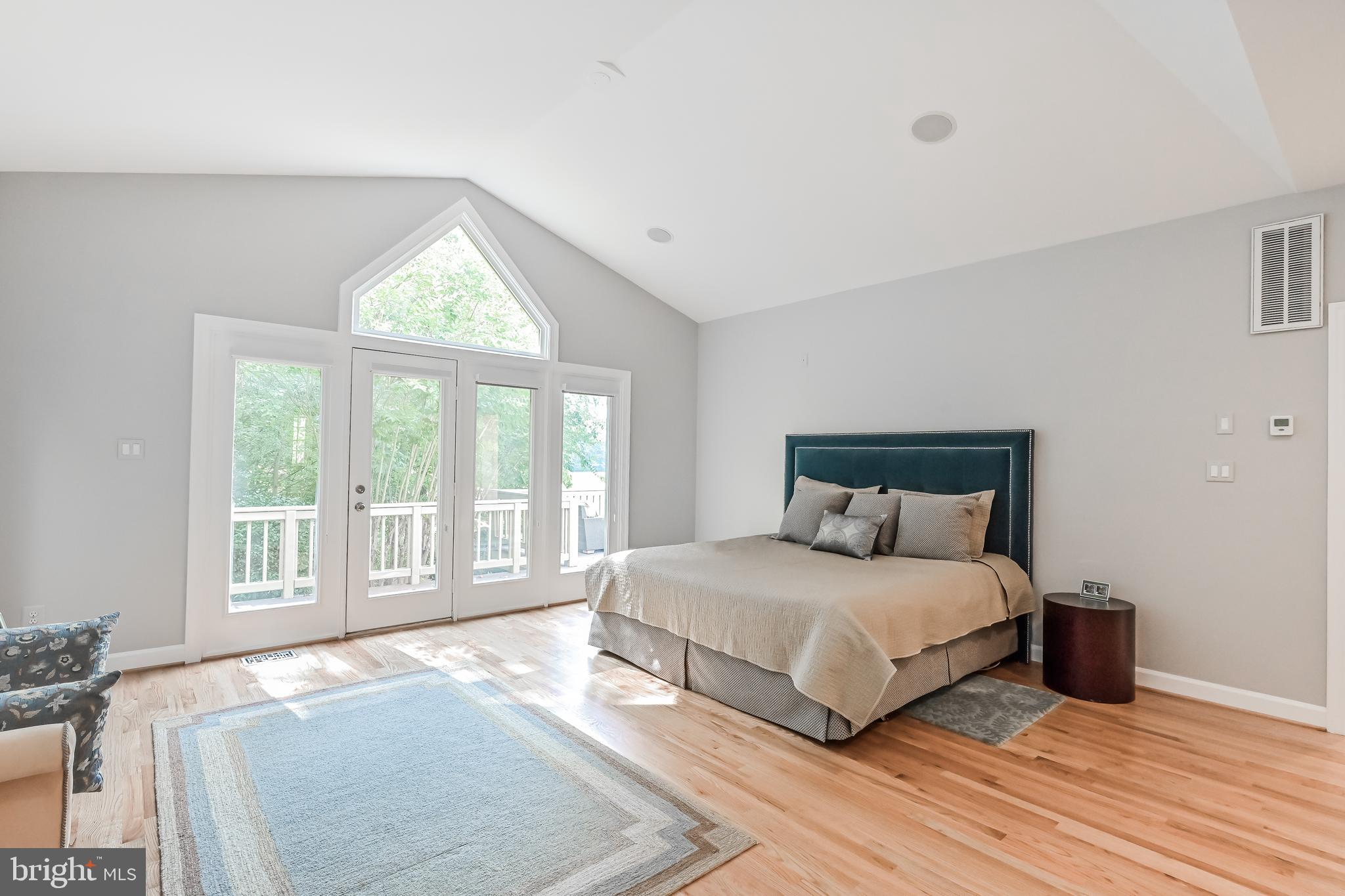 11311 Bright Pond Lane Reston, VA 20194 - Photo 20 of 50 Glass Door to Deck in Main Level Primary Bedroom