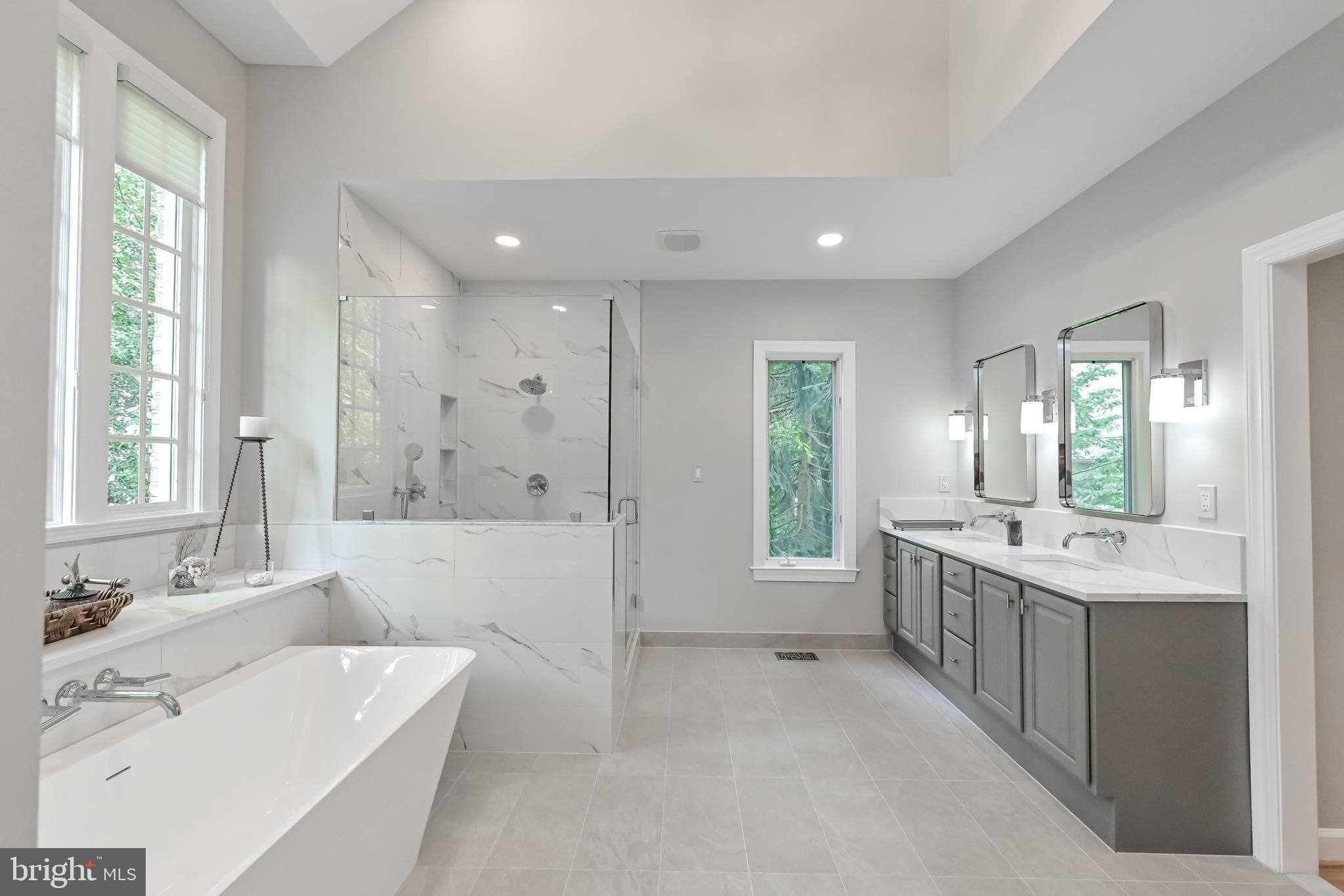 11311 Bright Pond Lane Reston, VA 20194 - Photo 24 of 50 Remodeled Primary Bath w/ Marble Style Tile