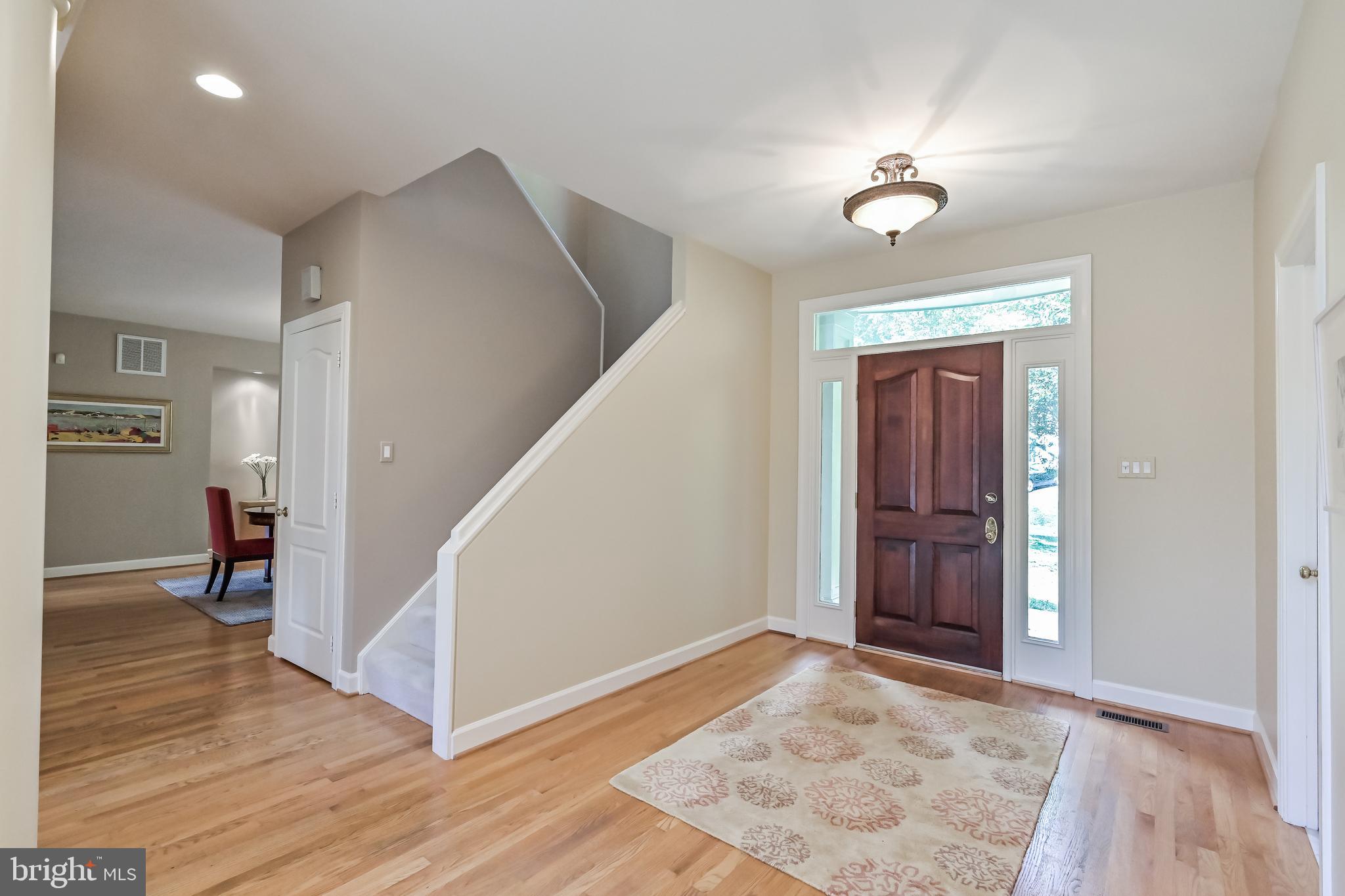 11311 Bright Pond Lane Reston, VA 20194 - Photo 3 of 50 Foyer w/ Hardwoods + Sidelites & Transom Window