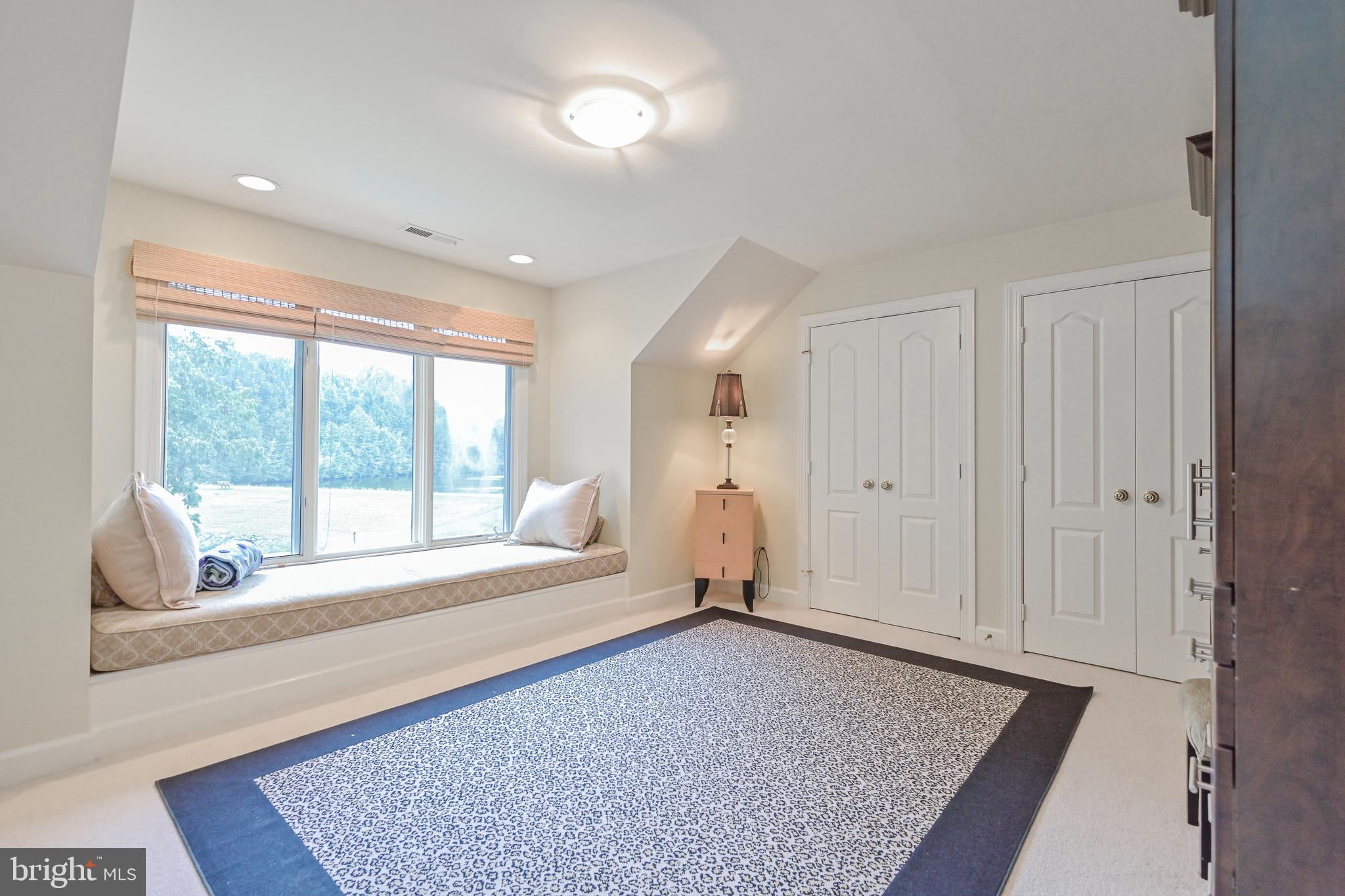 11311 Bright Pond Lane Reston, VA 20194 - Photo 31 of 50 Bedroom 3 with Bench Seating Nook + Water Views