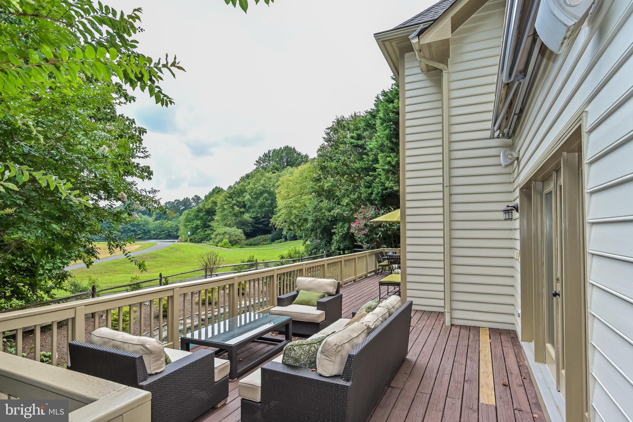 11311 Bright Pond Lane Reston, VA 20194 - Photo 43 of 50 Expansive Rear Deck Overlooking Pool & Pond