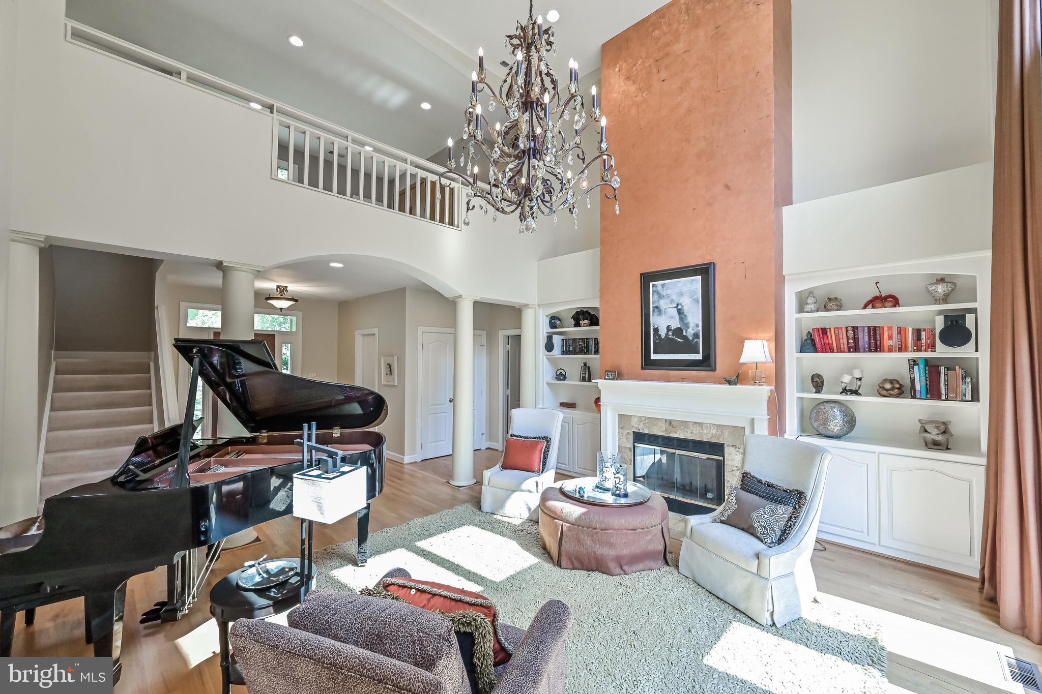 11311 Bright Pond Lane Reston, VA 20194 - Photo 6 of 50 Fireplace Flanked by Bookcases in Living Room