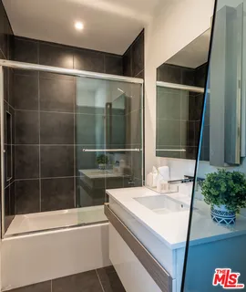 a bathroom with a sink and a toilet