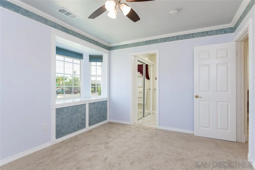 5168 Constitution Road San Diego, CA 92117 - Photo 20 of 25 a view of an empty room with a window