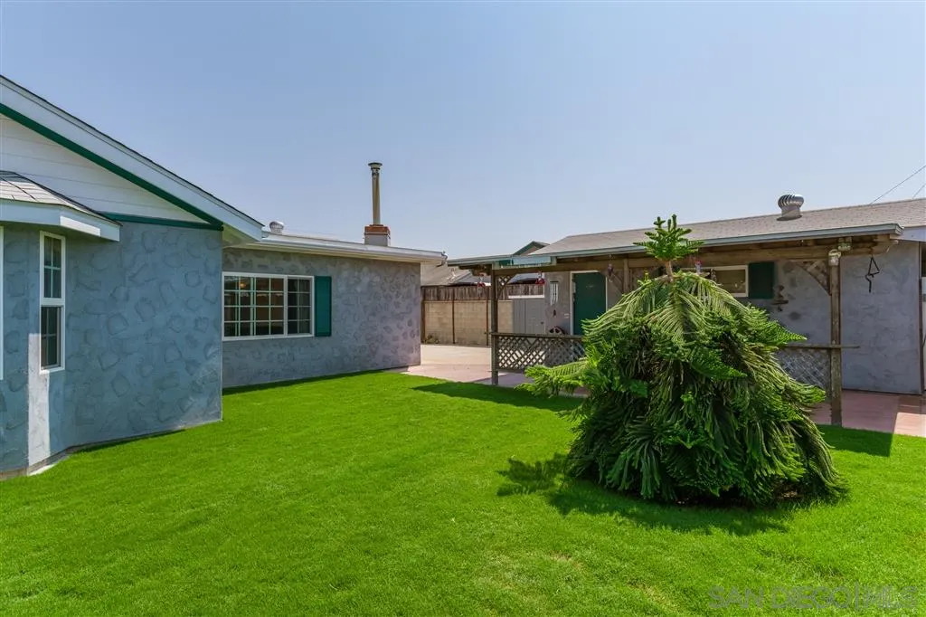 5168 Constitution Road San Diego, CA 92117 - Photo 25 of 25 a front view of a house with a garden