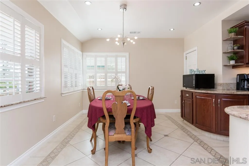 5168 Constitution Road San Diego, CA 92117 - Photo 4 of 25 a view of a dining room with furniture window and outside view