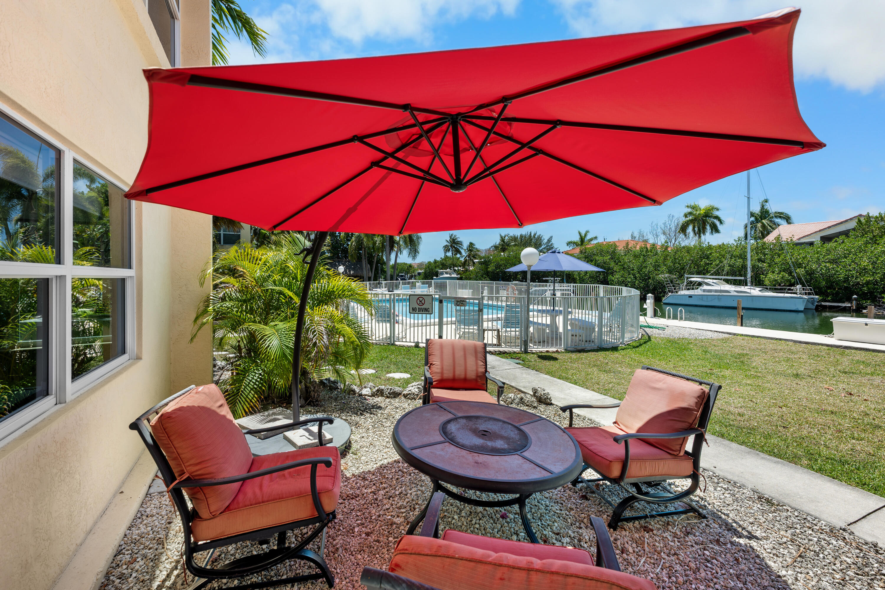 591 Sombrero Beach Road, Unit 1B Marathon, FL 33050 - Photo 3 of 31 Back door patio