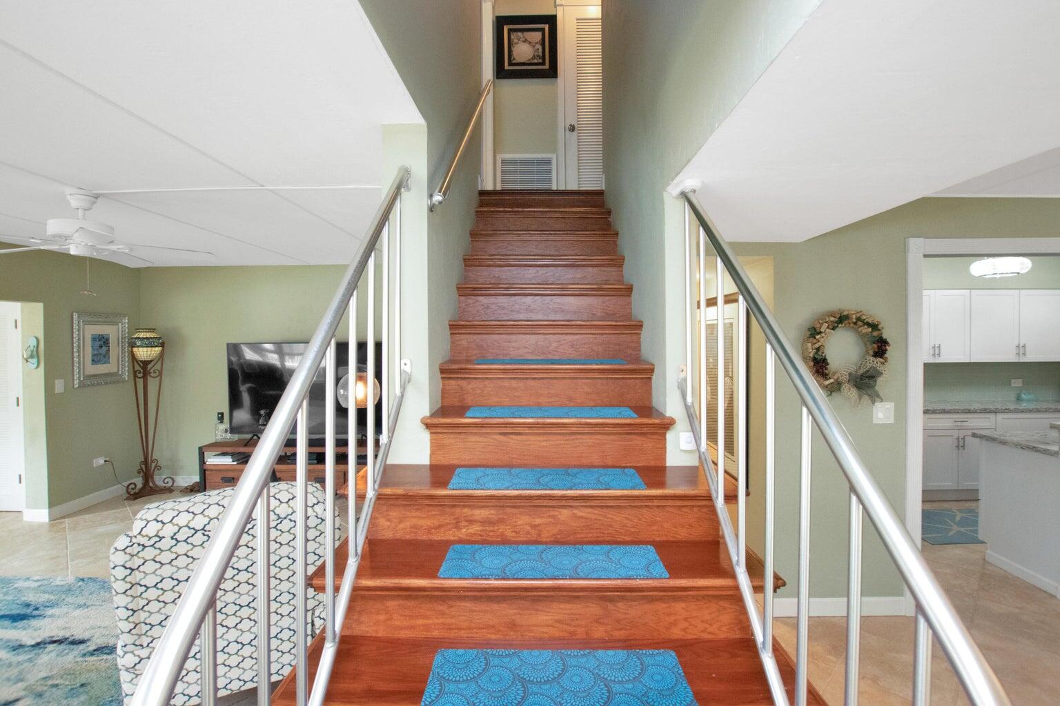 591 Sombrero Beach Road, Unit 1B Marathon, FL 33050 - Photo 8 of 31 Interior Staircase