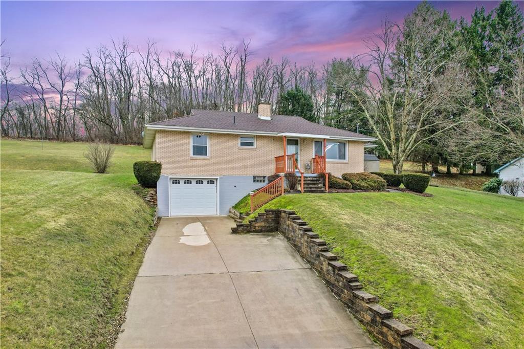 2861 Italy Road Export, PA 15632 - Photo 1 of 19 a front view of a house with garden