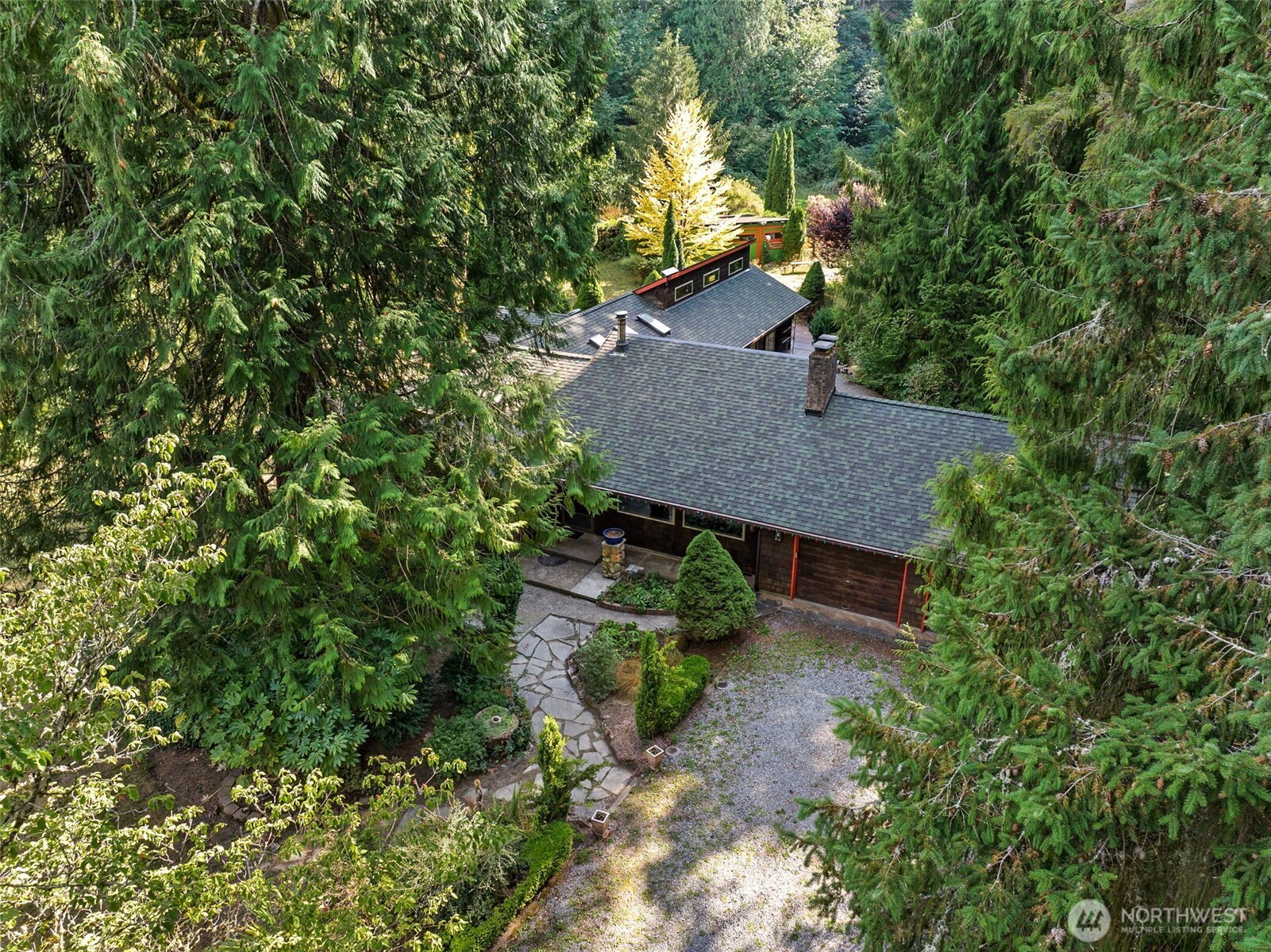 a house view with a backyard space