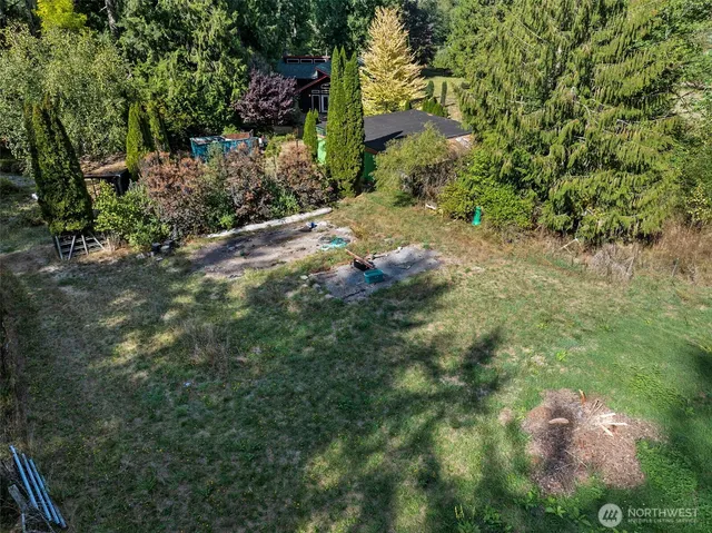 a view of backyard with green space