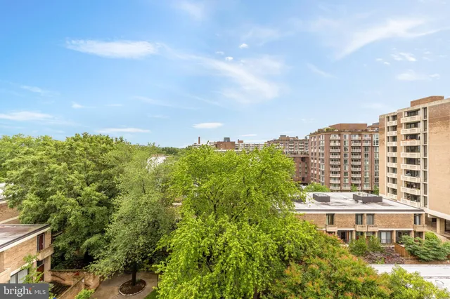 a view of a city with tall buildings