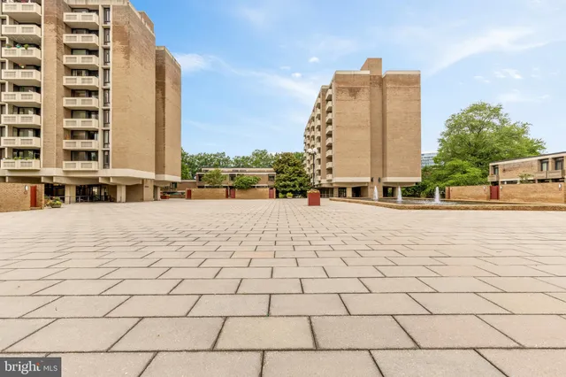 a view of a swimming pool with a lounge chairs