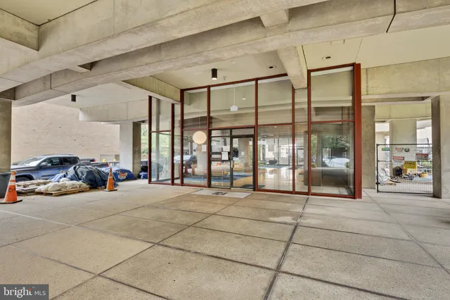 a room with natural light and glass door