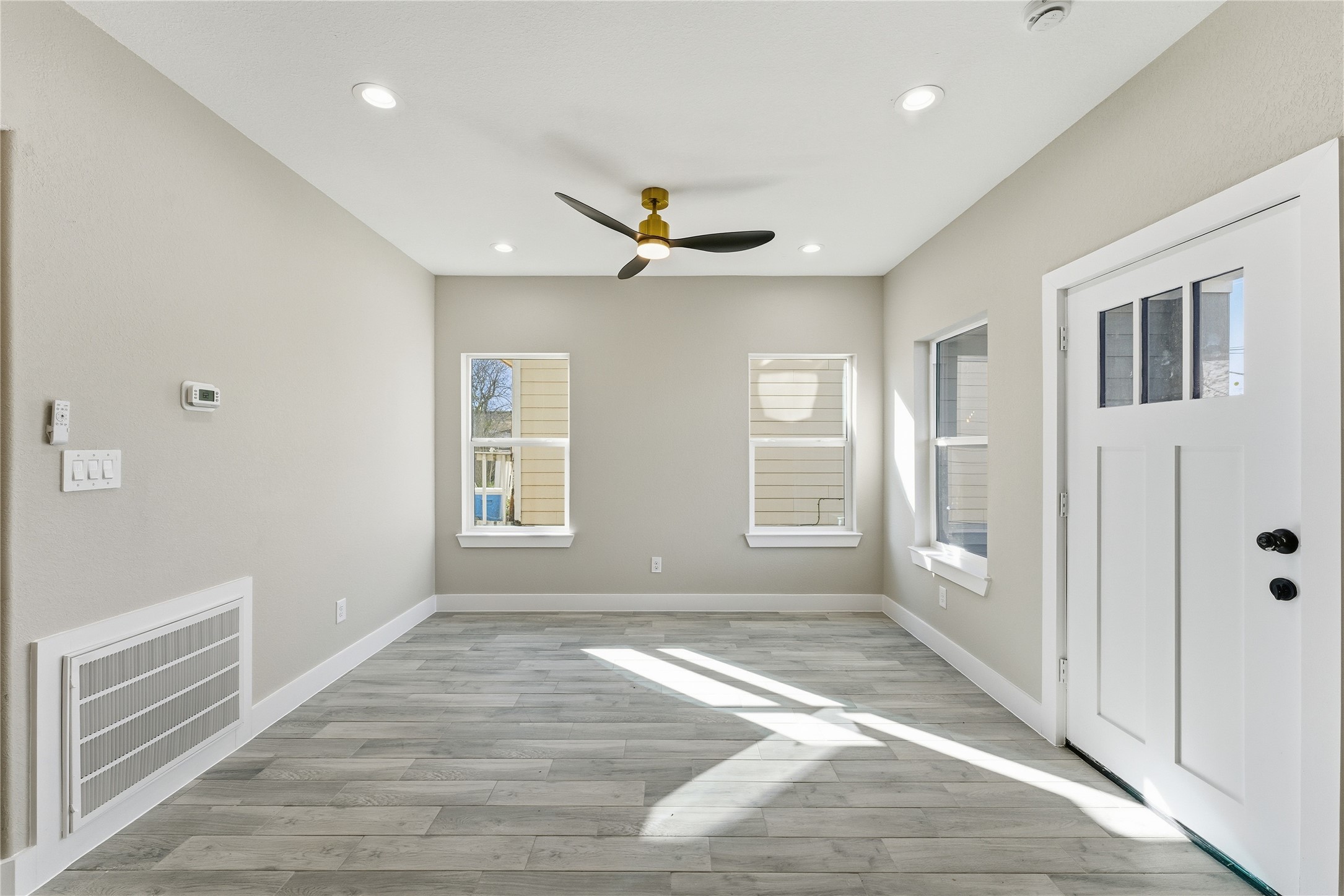 9722 Tuffly Street Houston, TX 77029 - Photo 14 of 16 a view of an empty room with a window