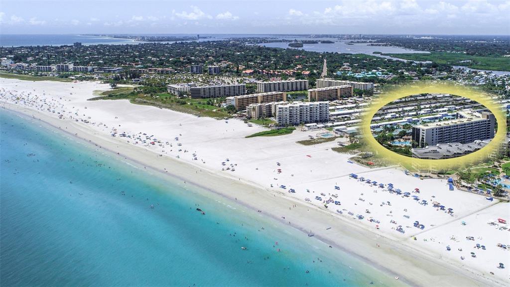 5880 Midnight Pass Road, Unit 210 Sarasota, FL 34242 - Photo 58 of 75 a view of a lake with a city