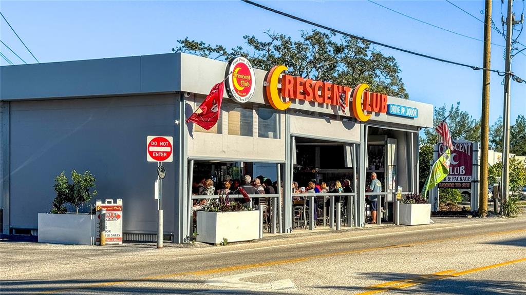 5880 Midnight Pass Road, Unit 210 Sarasota, FL 34242 - Photo 65 of 75 a view of street and shops