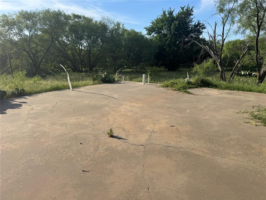 794 West Antelope Road Windthorst, TX 76389 - Photo 30 of 35 a view of outdoor space with trees