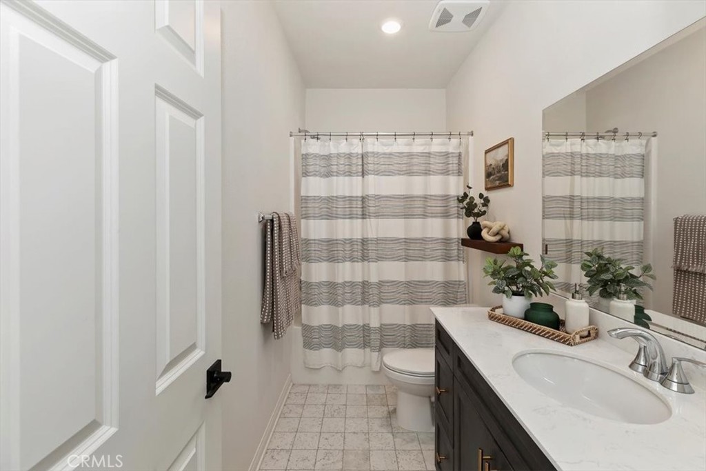 29224 Outback Lane Winchester, CA 92596 - Photo 25 of 35 a bathroom with a sink toilet and shower