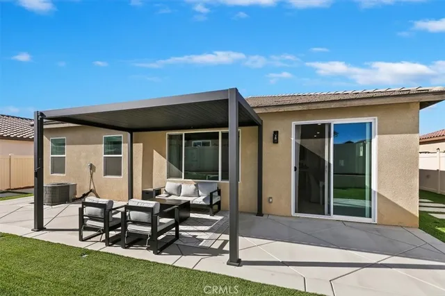 a view of a house with patio