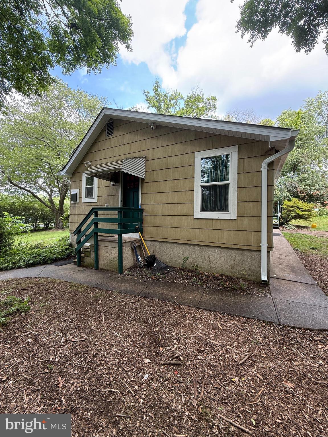6650 Montgomery Road Elkridge, MD 21075 - Photo 35 of 36 a view of a house with a yard