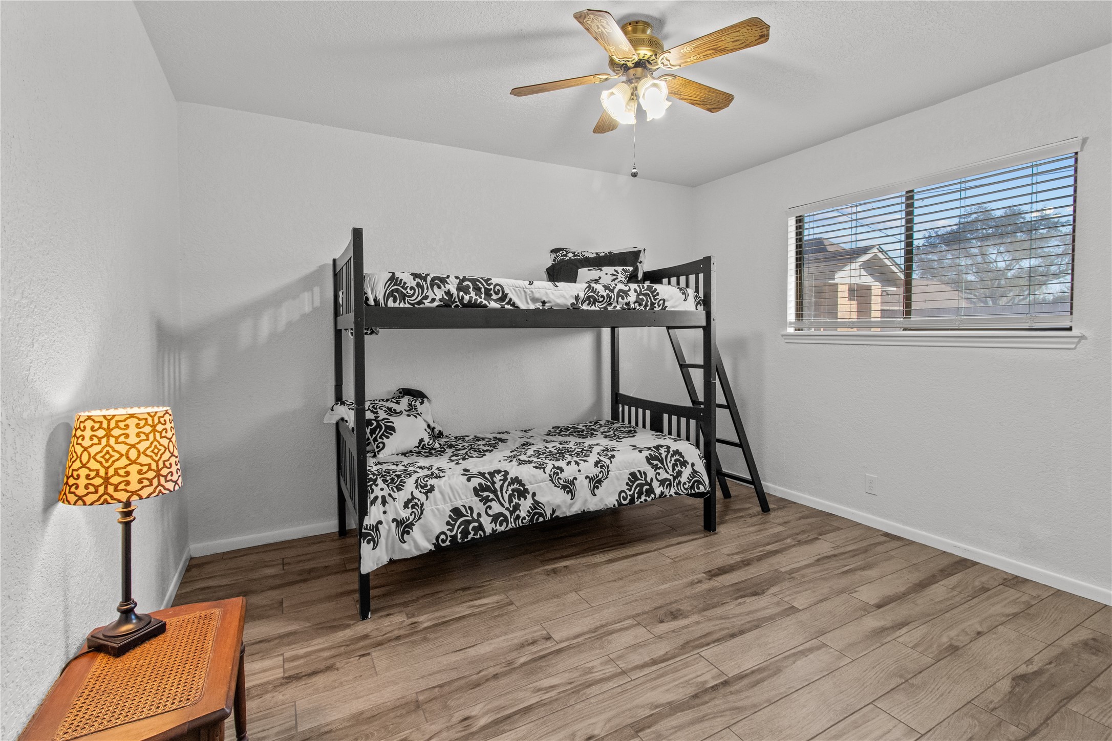 9 Colony Square Angleton, TX 77515 - Photo 12 of 23 a bedroom with bed and window