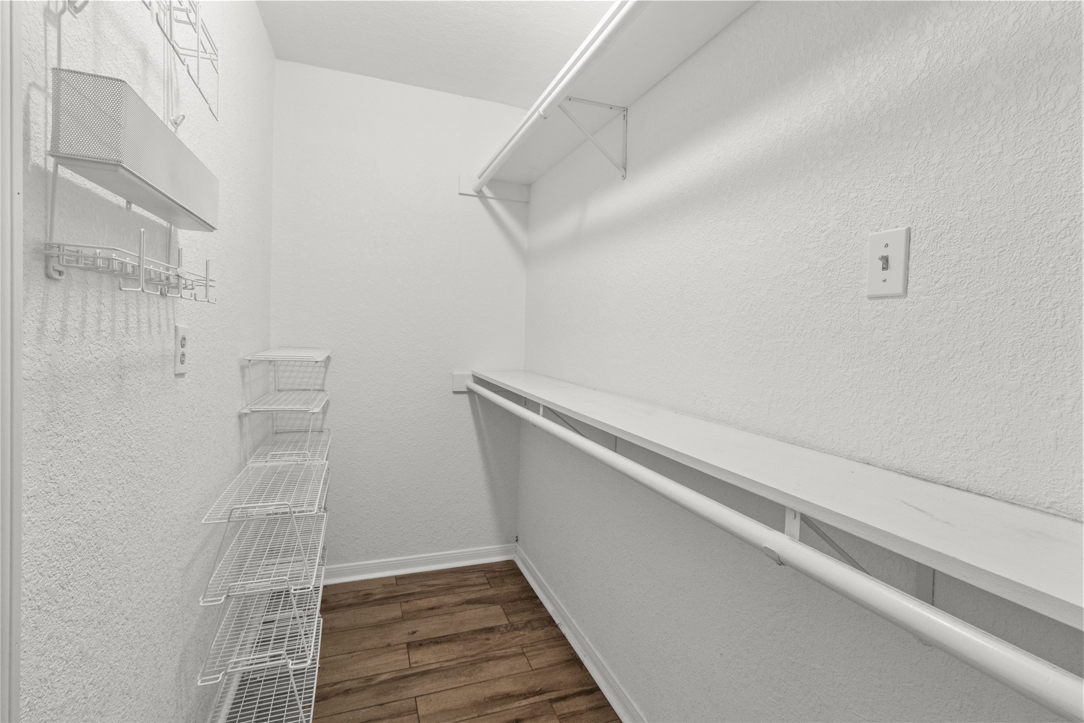 9 Colony Square Angleton, TX 77515 - Photo 19 of 23 a view of an empty walk in closet