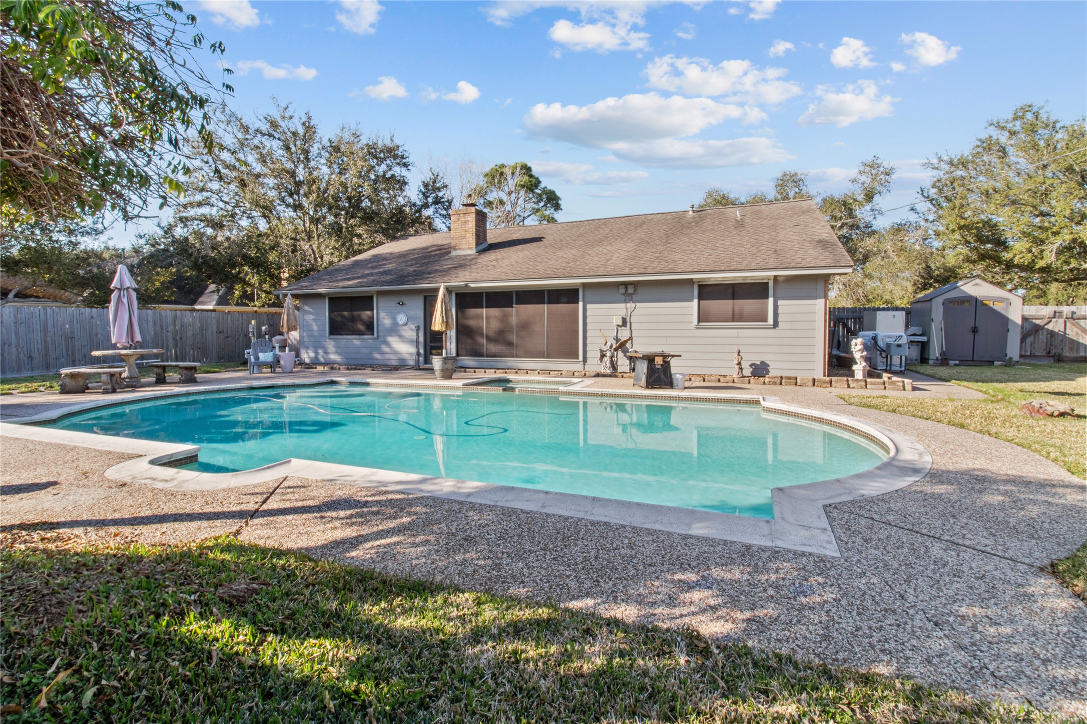 9 Colony Square Angleton, TX 77515 - Photo 2 of 23 a view of a house with a yard and plants