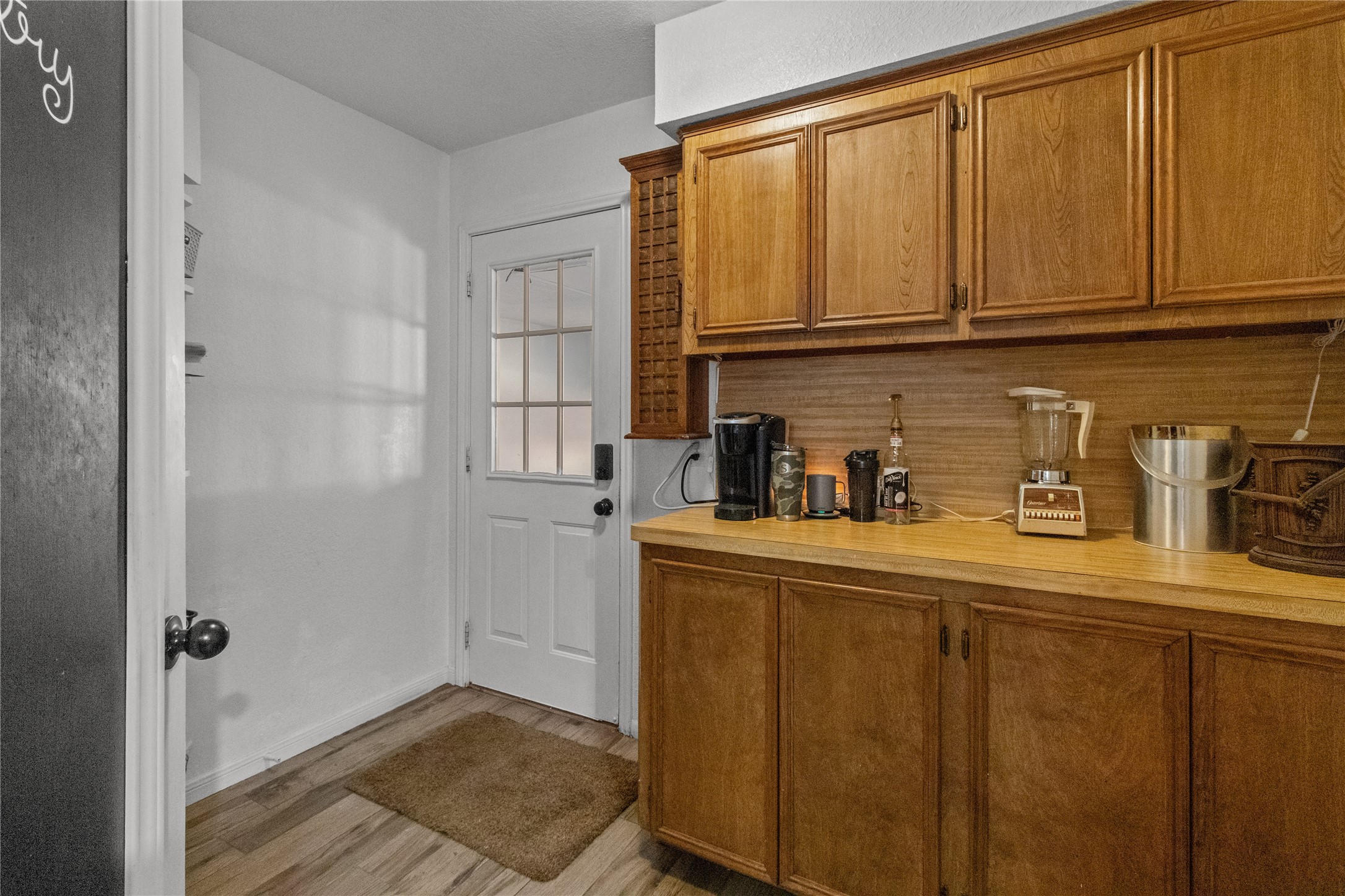 9 Colony Square Angleton, TX 77515 - Photo 21 of 23 a kitchen with stainless steel appliances granite countertop a refrigerator and cabinets