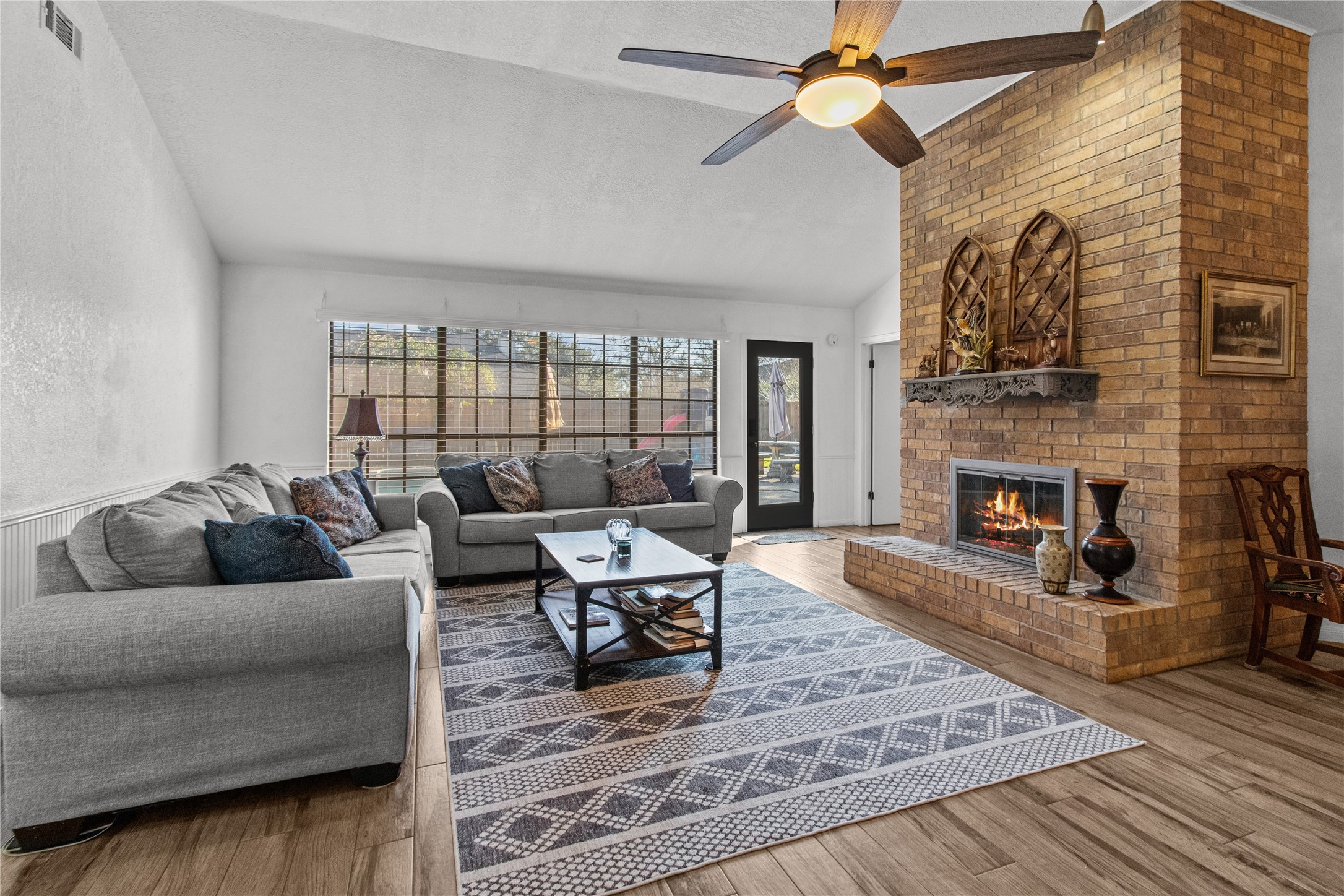 9 Colony Square Angleton, TX 77515 - Photo 8 of 23 a living room with furniture and a fireplace