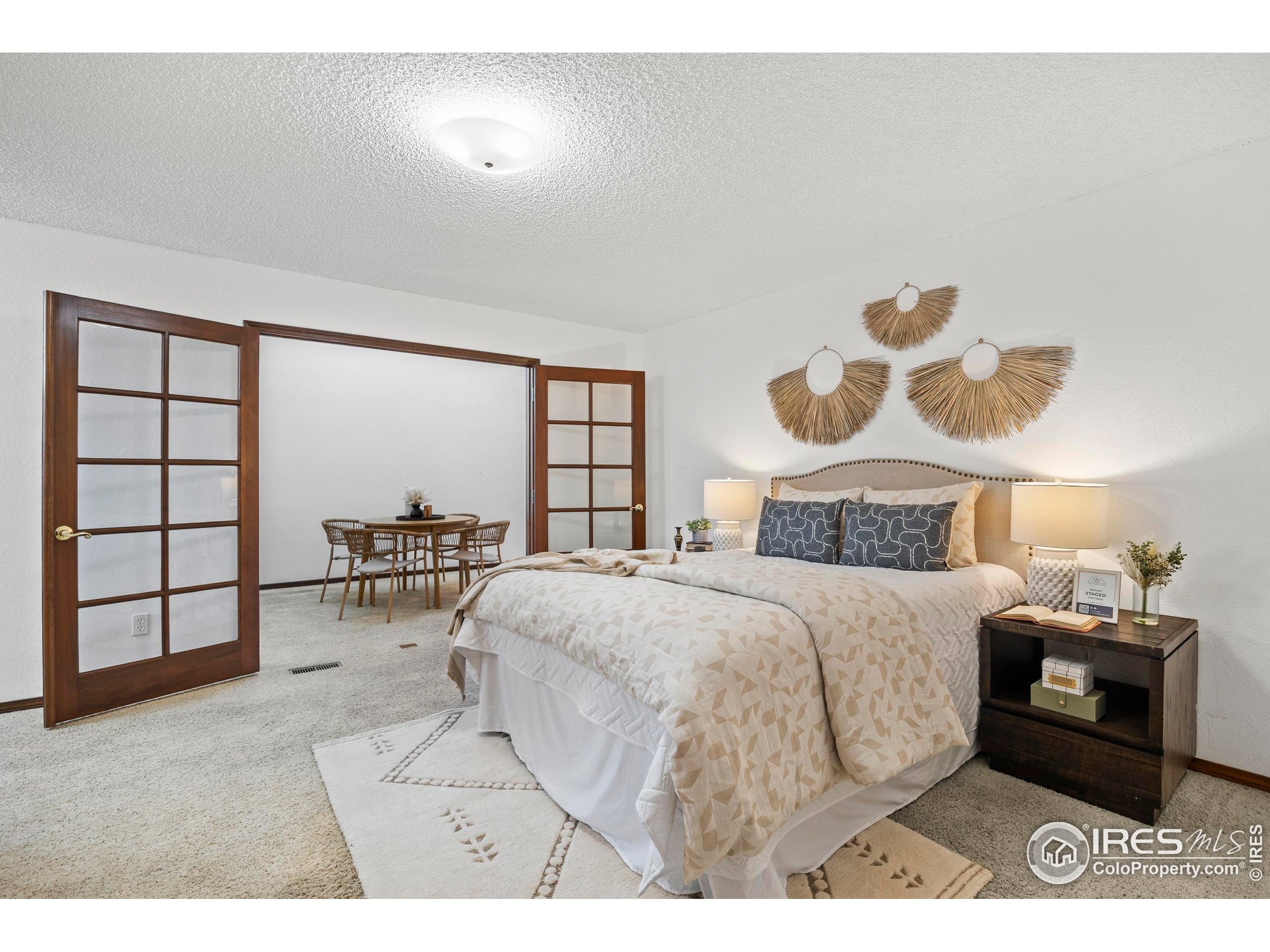 903 Conifer Court Windsor, CO 80550 - Photo 22 of 33 a living room with furniture and a window