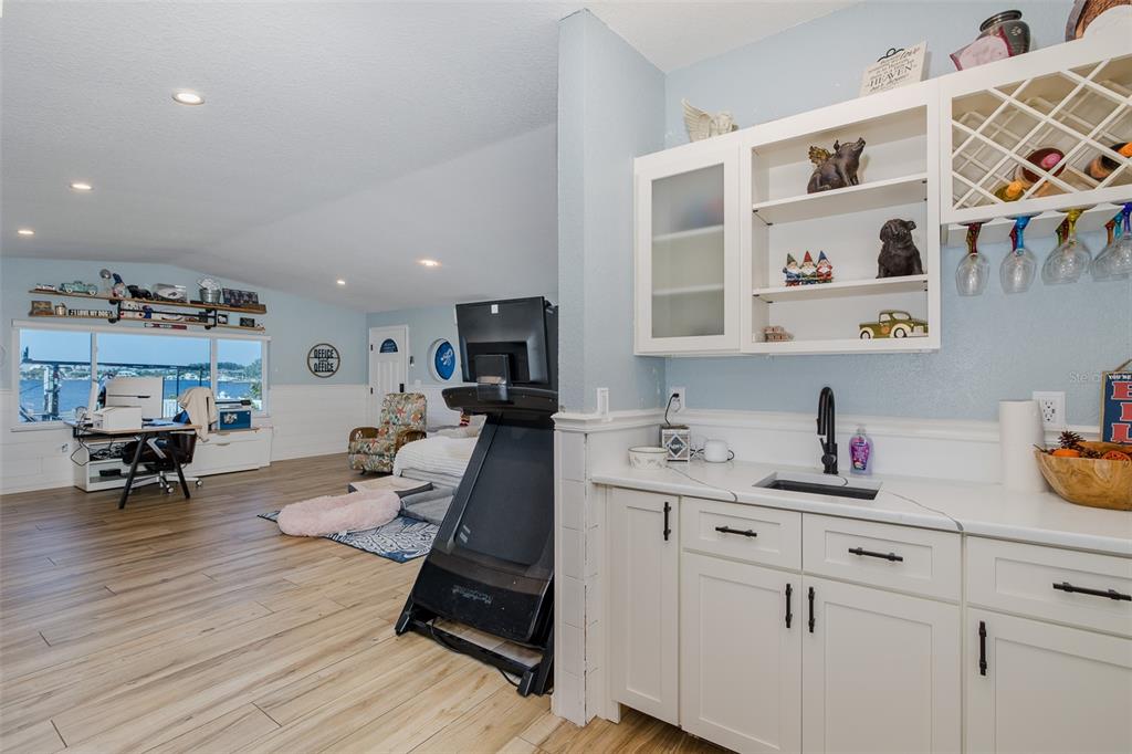 8211 Hayward Lane Port Richey, FL 34668 - Photo 33 of 65 a view of living room with furniture and wooden floor