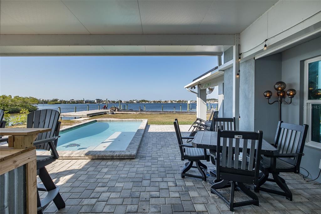 8211 Hayward Lane Port Richey, FL 34668 - Photo 43 of 65 a view of swimming pool with outdoor seating and city view