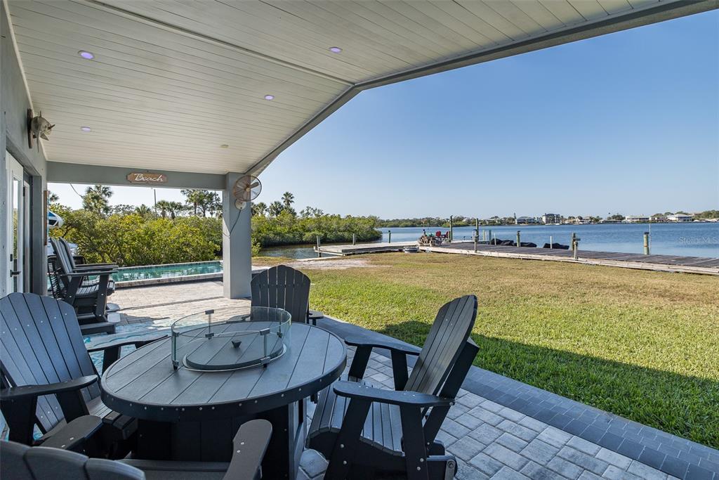 8211 Hayward Lane Port Richey, FL 34668 - Photo 46 of 65 a view of a dining room with furniture window and wooden floor